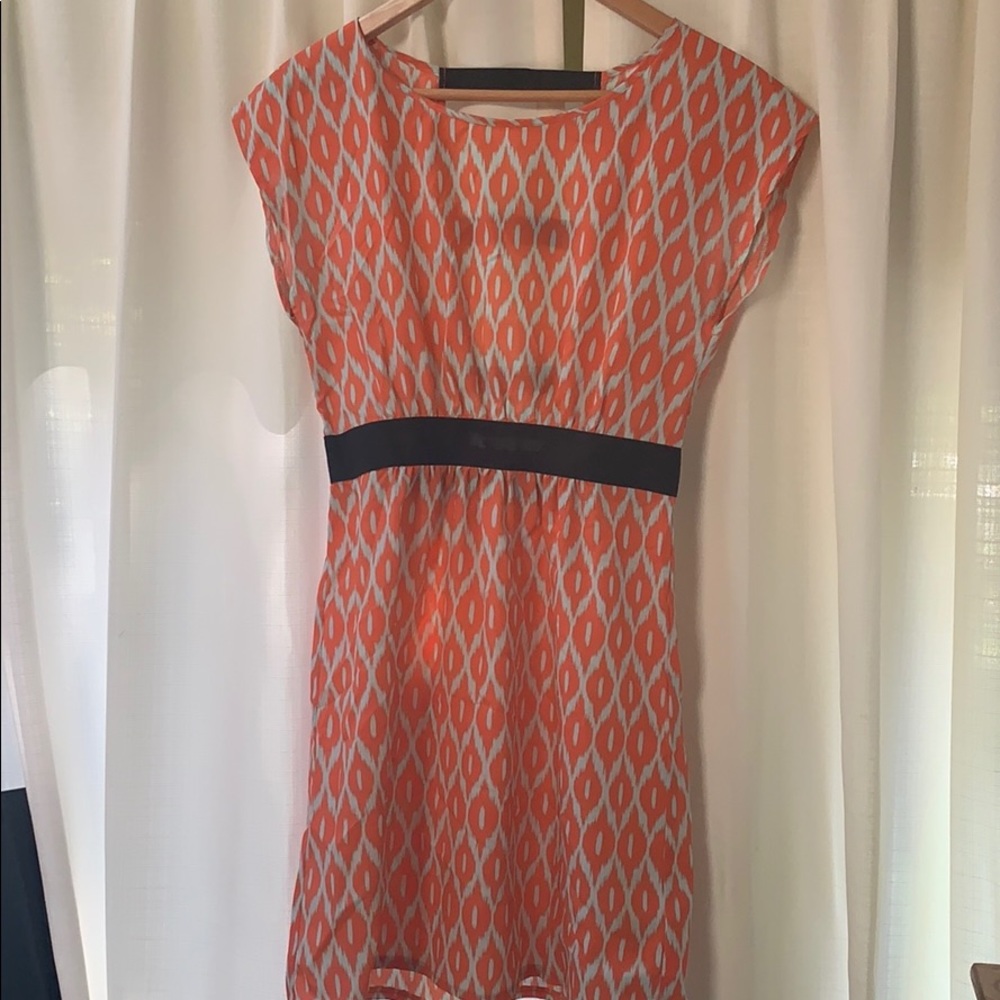 Coral dress with black trim